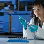 female scientist with syringe
