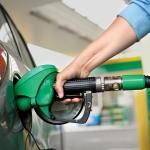 a Arm Refueling the Car at a Gas Station