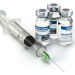 Vaccine in vial with syringe. Vaccination concept.
