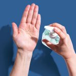 Applying sanitizer gel