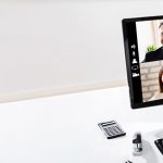 Woman Using The Computer With Invoice Form On Screen