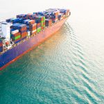 Aerial view container ship carrying container in import export b