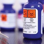 Chemicals syringe.Bottles of chemicals with a syringe.