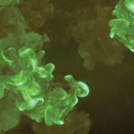 Explosion with green chemical smoke on dark background for graphic design. 3d rendering digital illustration