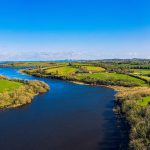 panorama aerial  view of sunny quoile river  winter countryside