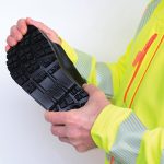 black work boots made of leather with reinforced cape, high top