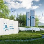 The concept of storing electrical energy in hydrogen by electrolysis. The system captures an electrolysis unit, storage tanks, solar and wind power plants on a lush lawn among the trees. 3d rendering